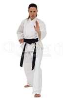 Female fighter performing karate stance