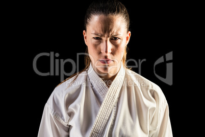 Female fighter on black background