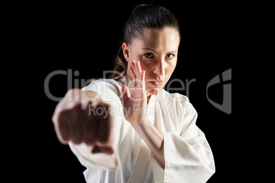 Female fighter performing karate stance