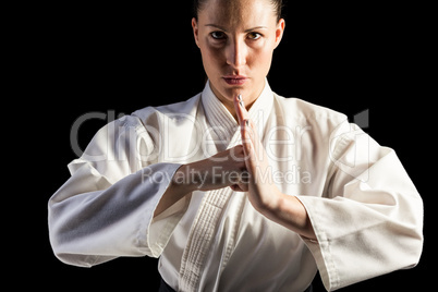 Female fighter performing hand salute