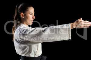 Female fighter performing karate stance