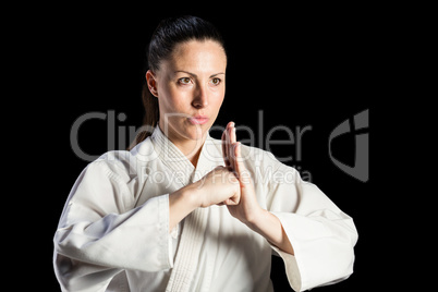 Female fighter performing hand salute