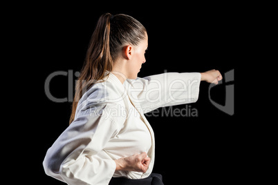 Female fighter performing karate stance