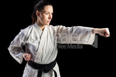 Female fighter performing karate stance