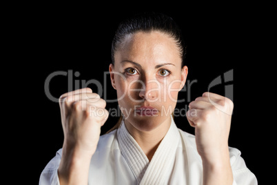 Female fighter performing karate stance