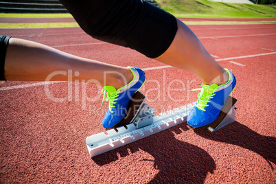 Female athlete ready to run