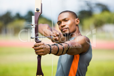 Athlete practicing archery