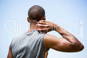 Male athlete about to throw shot put ball