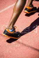 Athlete feet running on the running track