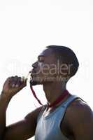 Athlete kissing his gold medal