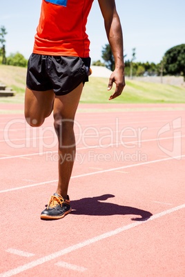 Athlete warming up on the running track