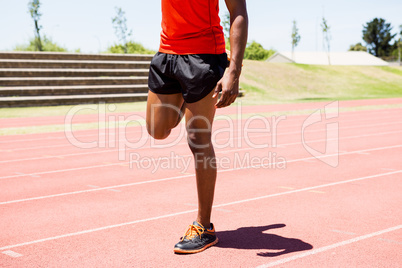 Athlete warming up on the running track