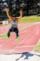 Athlete performing a long jump