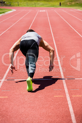 Athlete running on the running track
