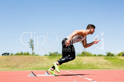 Athlete running on the running track