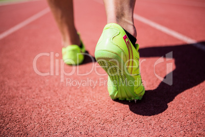 Athletes feet running on the racing track