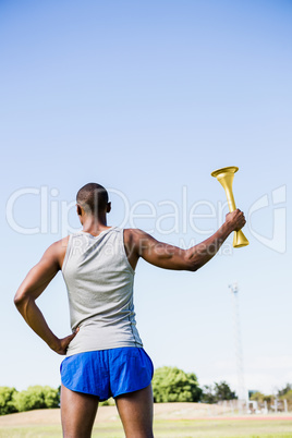 Athlete holding a fire torch