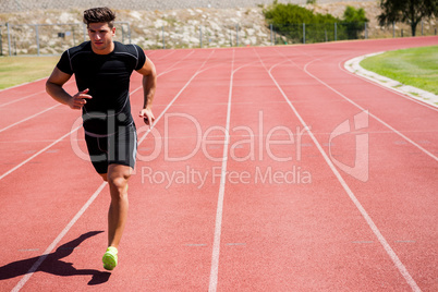 Athlete running on the racing track