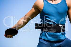 Athlete holding a discus
