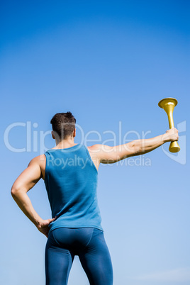 Athlete holding a fire torch