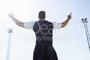 Soccer player posing after victory