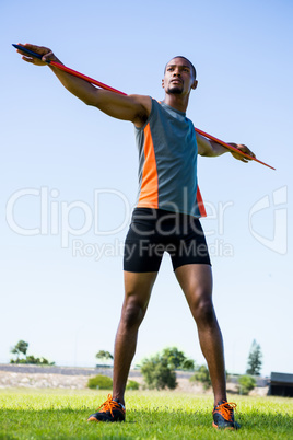 Athlete carrying javelin on his shoulder Athlete carrying javelin on his shoulder