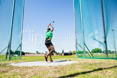 Athlete performing a hammer throw