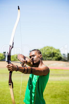 Athlete practicing archery