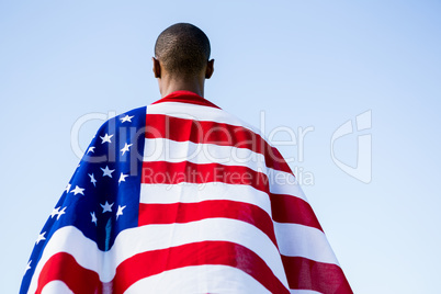 Athlete wrapped in american flag