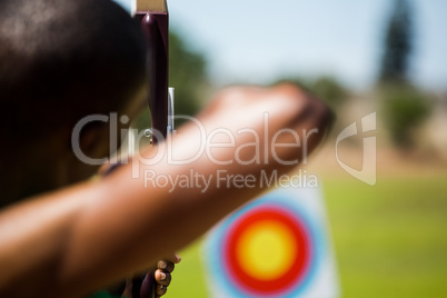 Athlete practicing archery