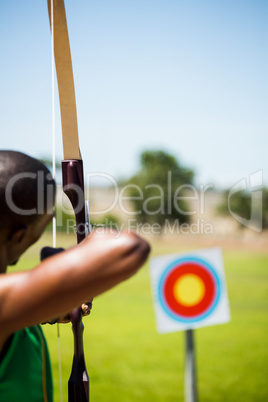 Athlete practicing archery