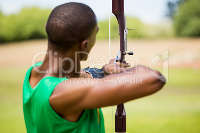 Athlete practicing archery