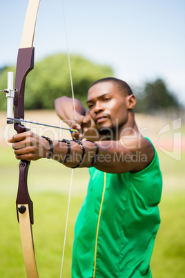 Athlete practicing archery