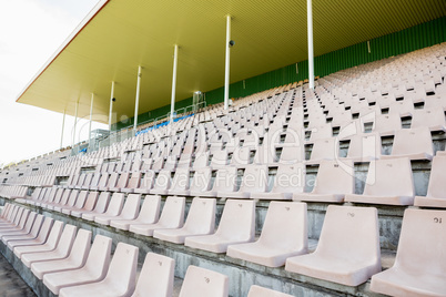 Empty row of white seats