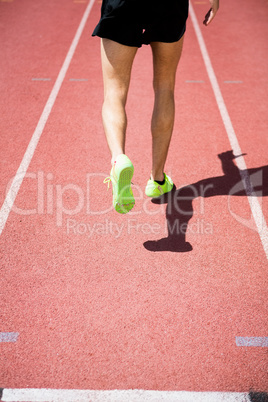 Athlete running on the racing track