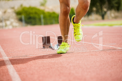 Athlete running on the racing track