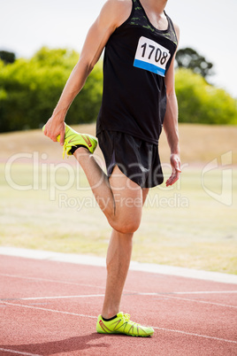 Athlete warming up on the running track