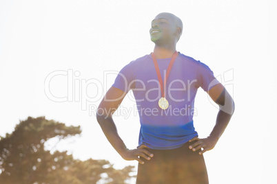 Athlete with gold medal around his neck