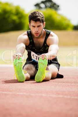 Athlete doing stretching exercise