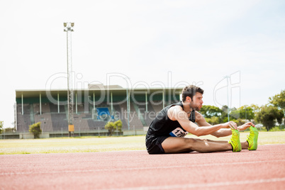 Athlete doing stretching exercise