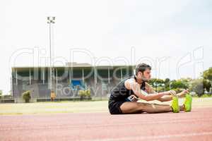 Athlete doing stretching exercise