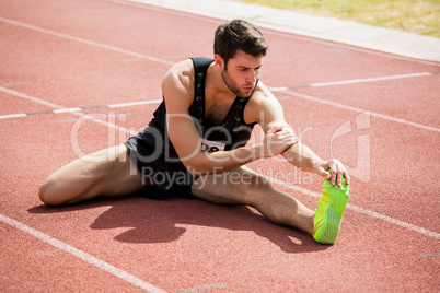 Athlete doing stretching exercise