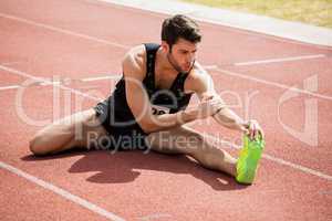 Athlete doing stretching exercise