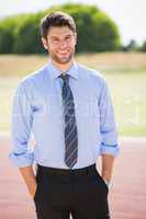 Portrait of businessman standing with hands in pocket