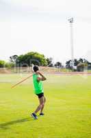 Rear view of an athlete about to throw a javelin