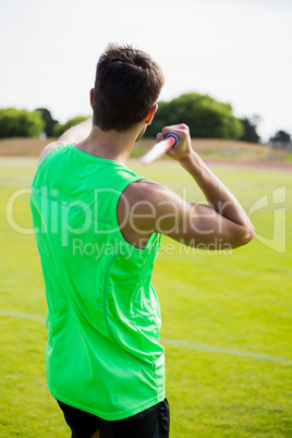 Rear view of an athlete about to throw a javelin