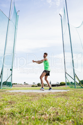 Athlete performing a hammer throw