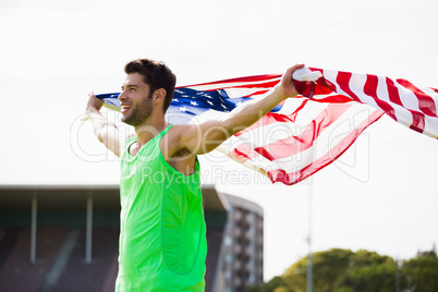 Athlete posing with american flag