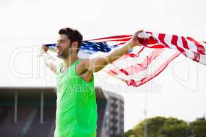 Athlete posing with american flag