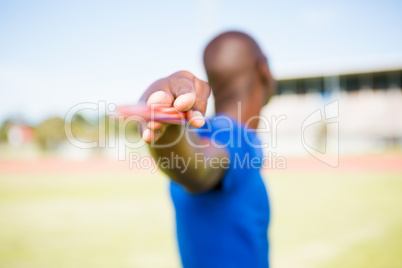 Athlete standing with javelin